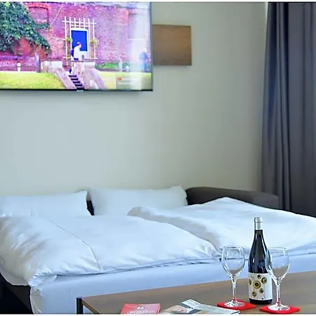 Motel Plus Schoenefeld Апарт-отель Шёнефельд
